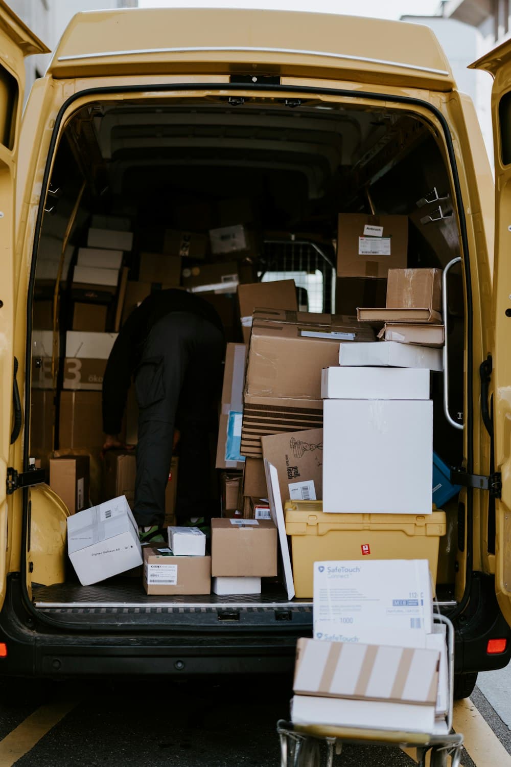 Removal van fully loaded with boxes ready for a long-distance move